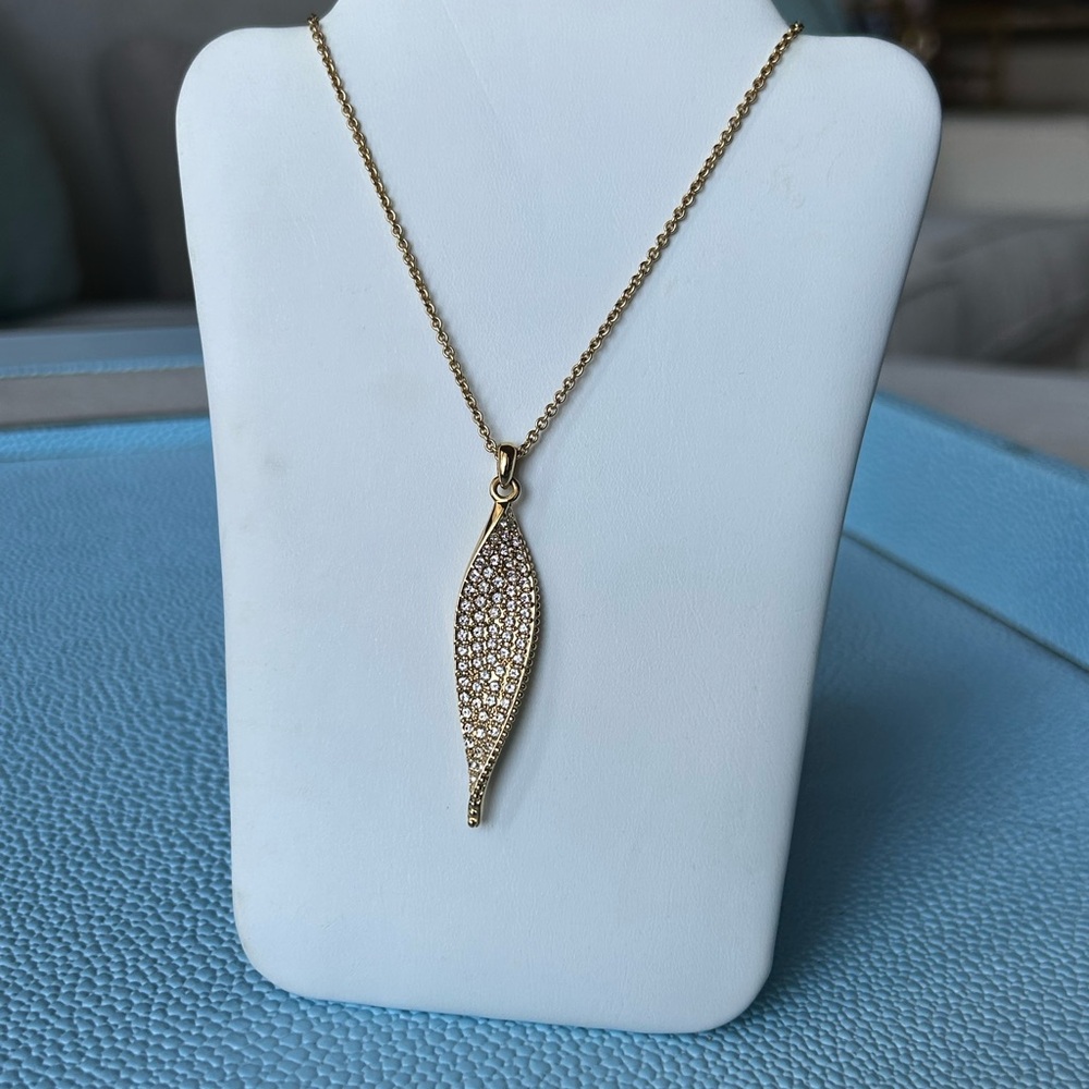 New in box Touchstone Crystal by Swarovski Do the twist pendant